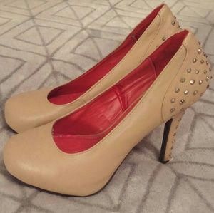 Nude spike heels
